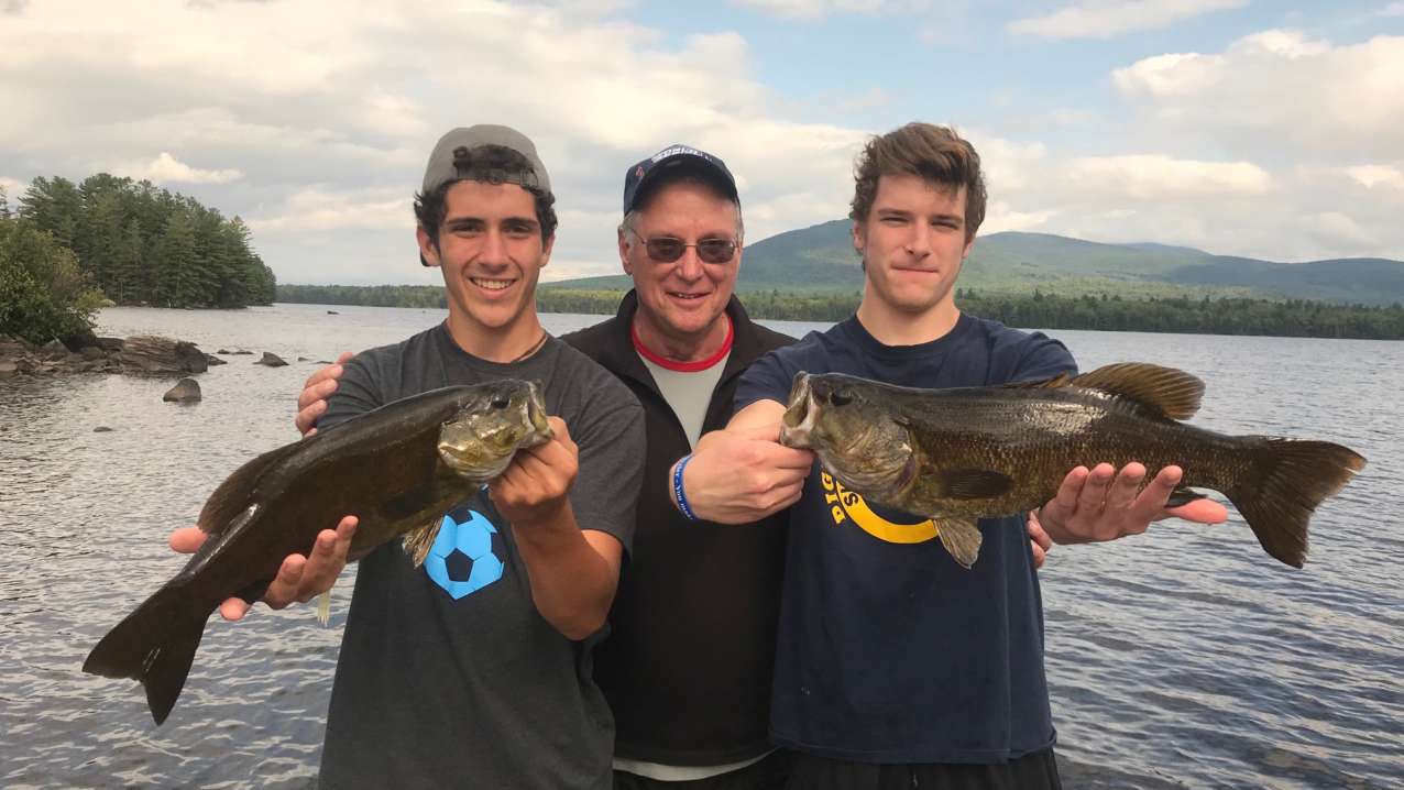 The dog days of summer are all about guided smallmouth bass trips in Maine